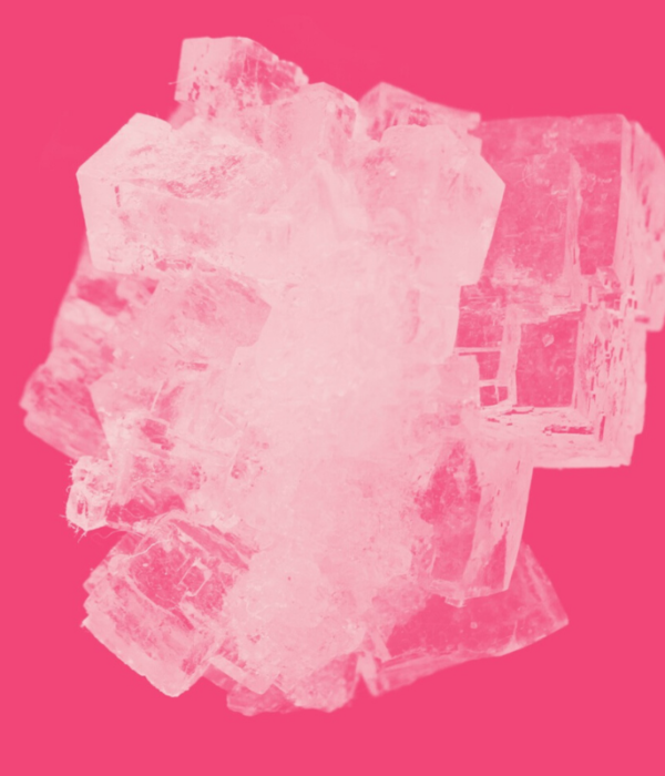 salt crystal closeup pink background